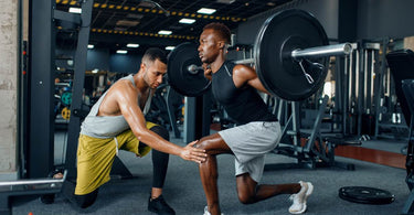 Image of a person lifting with a partner